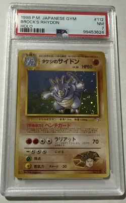 1998 Pokemon Japanese Gym #112 Brock’s Rhydon Holo PSA 7 NM - Image 1