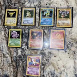 Pokemon 1995 Two First Edition, Five Holo, Three Dark, One Black Star Promo - Image 1
