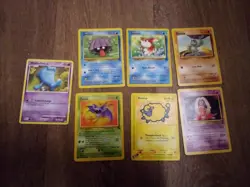 Lot of 7 Pokemon Cards Older Cards non Holo Rare and WOTC included - Image 1