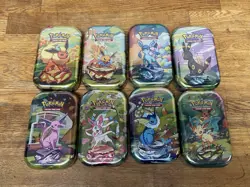 Pokemon TCG Prismatic Evolutions Full Set of 8 Sealed Mini Tins With Display - Image 3