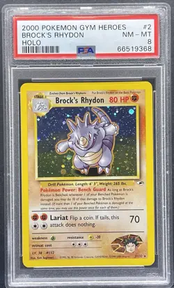 2000 Pokemon Gym Heroes Brock’s Rhydon Holo #2 PSA 8 NM-MT - Image 1