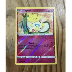 Pokemon TCG Togepi 136/214 Unbroken Bonds Reverse Holo - Image 1