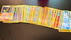 Bulk lot of 57 pokemon cards multiple sets - Image 1