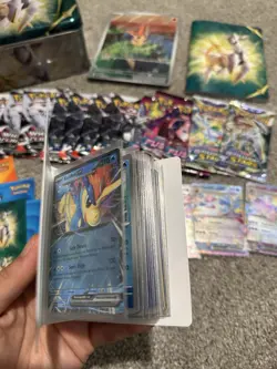 Pokemon LOT! (Binder, Sleeves, Tins, Packs, Singles, Stickers, Posters Etc..) - Image 5