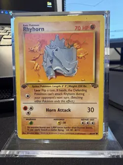 Pokemon Rhyhorn 61/64 - NM - 1999 1st Edition Jungle - Common - Image 1