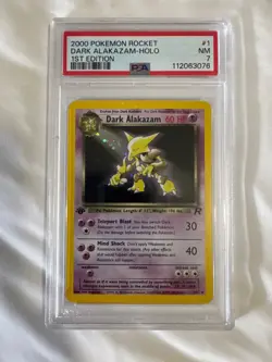 2000 Pokemon Team Rocket Dark Alakazam 1st Edition Holo #1/82 (PSA 7) - Image 1