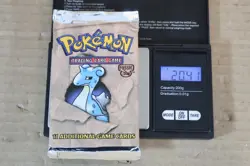 POKEMON FOSSIL BOOSTER PACK LAPRAS SEALED WOTC 1999 1ol - Image 1