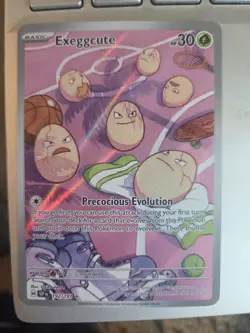 Pokemon Exeggcute 30 HP Sv08: Surging Sparks 192/191 Illus Rare Holo EN - Image 1
