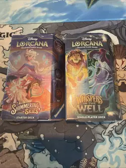 Disney Lorcana: Whispers in the Well And Shimmering Skie-Set of 2- Starter Decks - Image 1