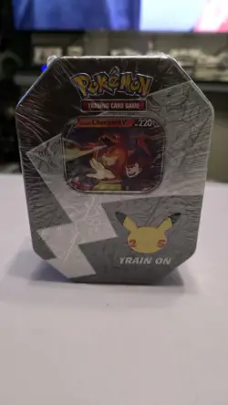 Pokemon TCG 25th Celebrations Lance's Charizard Tin factory sealed - Image 1