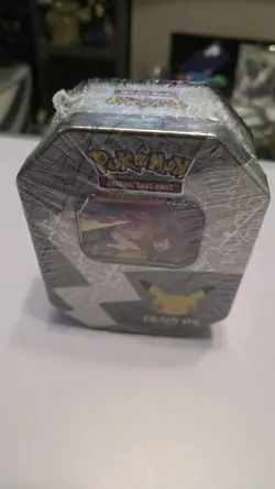 Pokemon TCG 25th Celebrations Lance's Charizard Tin factory sealed - Image 2