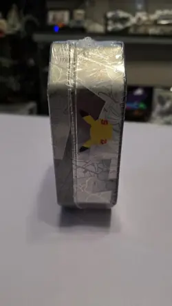 Pokemon TCG 25th Celebrations Lance's Charizard Tin factory sealed - Image 3