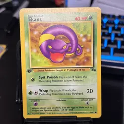 Pokemon 1st Edition Arbok 31/62 and Ekans 46/62 Fossil MP - Image 1