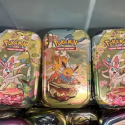 Pokemon TCG Sealed Booster Tin Box “2 prismatic evolution packs inside” - Image 1