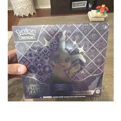 Pokemon Scarlet & Violet Paldean Fates ETB Booster Promo Mimikyu (Small Rip) - Image 1