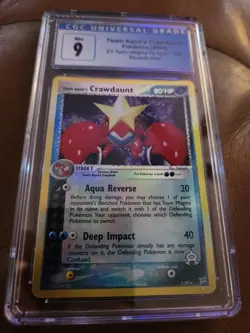 Pokemon CGC 9 MINT Team Aqua's Crawdaunt 2/95 EX Magma vs Aqua Reverse Holo - Image 1