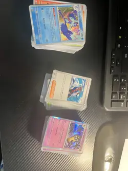 Surging Sparks bulk for master set 94 holos and reverse 38 trainers 197 Pokemon - Image 1