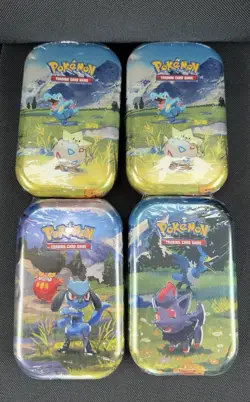 Pokemon TCG 4 sealed tins - Image 1