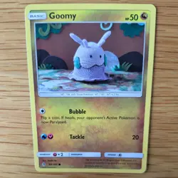GOOMY 94/145 POKEMON CARD (GUARDIANS RISING SET) ASAKO ITO CROCHET - Image 1
