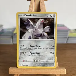 POKEMON DURALUDON 129/185 RARE COSMOS HOLOFOIL VIVID VOLTAGE CARD - Image 1