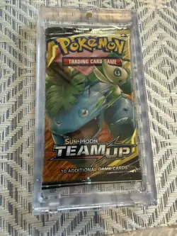 Pokemon TCG Sun & Moon Team Up Booster Pack in case - Image 1
