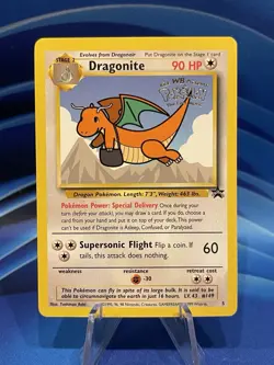 1999 Pokemon First Movie Dragonite Promo Card Gold WB Stamp - Image 1