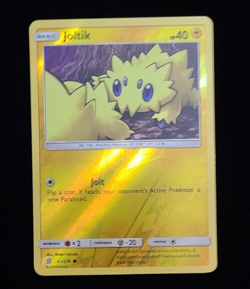 Pokemon- Unified Minds- Joltik 61/236- Reverse Holo Card - Image 1