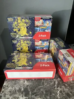 Pokemon Surging Sparks Elite Trainer Box and Booster Bundle Costco, 2-Pack - Image 1