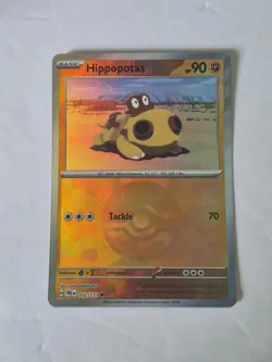 Hippopotas (Poke Ball Pattern) 052/131 Holo SV: Prismatic Evolutions Pokemon NM - Image 1