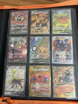 Lot of 27 Pokemon cards Charizard v alt art promo Mega Houndoom EX with binder - Image 1