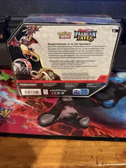 🤯Pokemon TCG Paldean Fates Booster 5-Pack Tin With Charizard Promo Card - Image 2