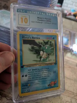(POP 7) CGC 10 PRISTINE Misty's Horsea 87/132 1st Edition Gym Challenge Pokemon - Image 1