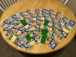 Lot of 100 Pokemon Cards Sleeved!!! No Repeats!!! Good Condition! - Image 1