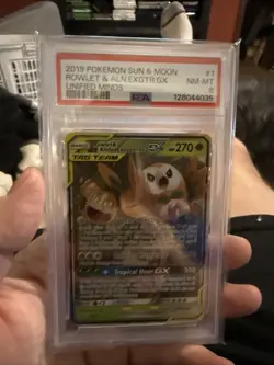 2019 POKEMON SUN & MOON UNIFIED MINDS #1 ROWLET & ALOLAN EXEGGUTOR GX PSA 8 - Image 1