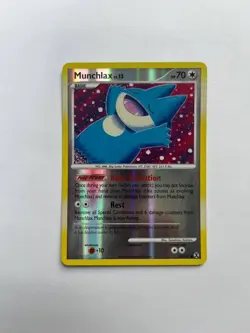 2009 POKEMON MUNCHLAX #69/111- RISING RIVALS- COMMON-REV HOLO- LP - Image 1