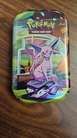Pokemon Prismatic Evolutions Mini Tin Factory Sealed with Two Packs of Cards - Image 2