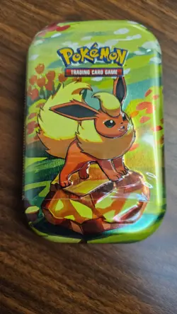 Pokemon Prismatic Evolutions Mini Tin Factory Sealed with Two Packs of Cards - Image 5
