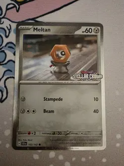 Meltan (Cosmos Holo) Stellar Crown Stamped 102/142 Yuka Morii Pokemon Card NM - Image 1