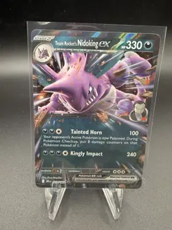 Pokemon Team Rocket’s Nidoking ex 119/182 SVP 217 Sv: Destined Rivals Holo - Image 1