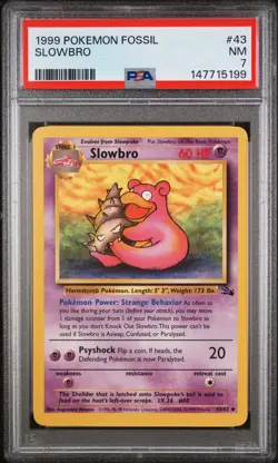 1999 POKEMON FOSSIL #43 SLOWBRO PSA 7 - Image 1