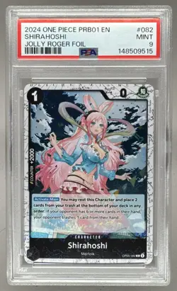 148509515 Shirahoshi 2024 One Piece The Best #OP05-082 Jolly Roger Foil PSA 9 - Image 1