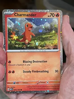 POKEMON CHARMANDER 004/165 COMMON COSMOS REVERSE SWIRL SCARLET & VIOLET MEW - Image 1