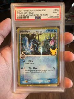 2021 Pokemon SWSH Black Star Promo Celebrations Mimikyu-Holo Card #136, PSA 9 - Image 1