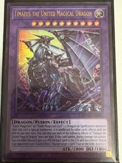 YUGIOH- Timaeus The United Magical Dragon - MZMU-EN012 - Ultra Rare 1st Ed. - Image 1