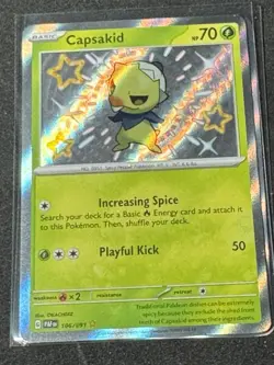 Capsakid 106/091 SV: Paldean Fates Holo Baby Shiny Pokemon Tcg - Image 1
