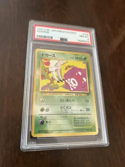 1997 Pokemon Japanese Rocket #109 - Koffing PSA 8 - Image 1