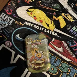 Pokemon TCG Prismatic Evolutions Jolteon Mini Tin - Sealed - 2 Booster Packs - Image 1