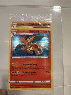 Pokemon Special Delivery Charizard SWSH075 Sealed Promo *Double Card Error* - Image 1