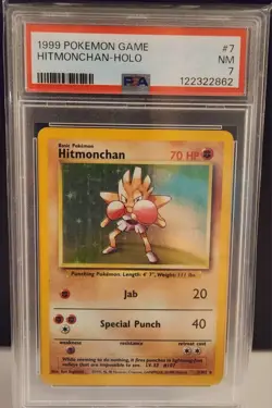 Pokemon: 1999 BASE SET UNLIMITED #7 HITMONCHAN-HOLO PSA 7 - Image 1