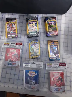 Pokemon 3 Card Booster Lot 45 - Minds, Celestial, Bonds, Sword, Sun + 3 Binders - Image 1